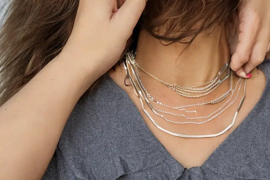 The trend of layering necklaces and how to do it right